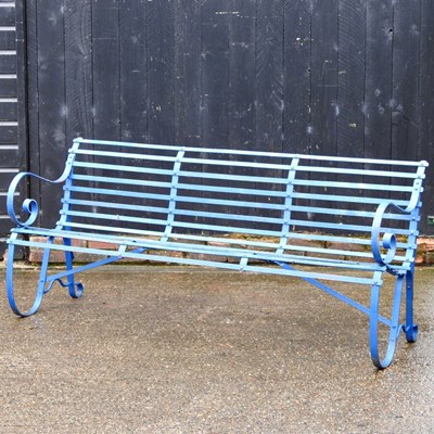 Lot 1 - A blue painted iron garden bench, with a...