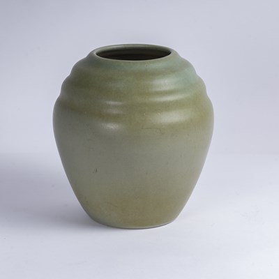 Lot 48 - A green glazed stoneware vase, 20th century,...