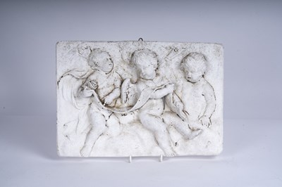 Lot 153 - A plaster panel, relief decorated with putti,...