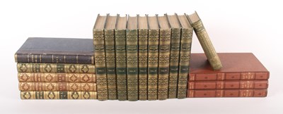 Lot 188 - A collection of books, some with leather...