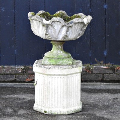 Lot 16 - A cast stone garden urn, on a pedestal base,...