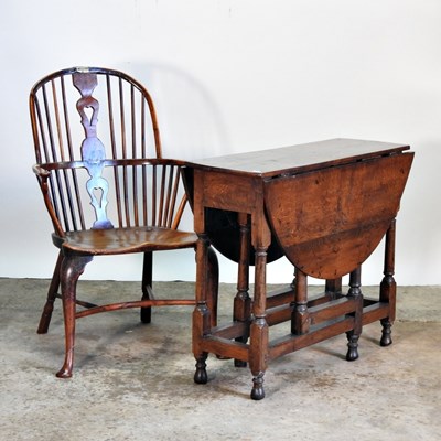 Lot 345 - A 19th century elm seated windsor armchair,...