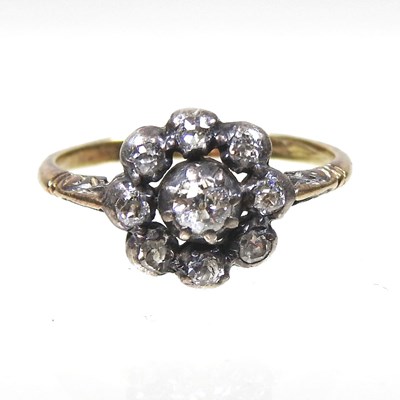 Lot 108 - An 18 carat gold and platinum set diamond...