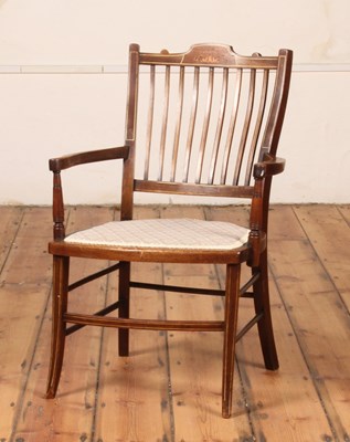 Lot 343 - An Edwardian mahogany open armchair, having a...