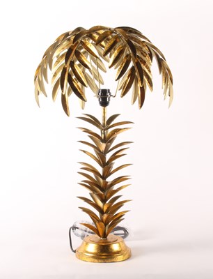 Lot 36 - A gilt metal table lamp, in the form of a palm...