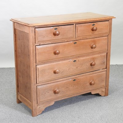 Lot 524 - A modern light oak chest of drawers