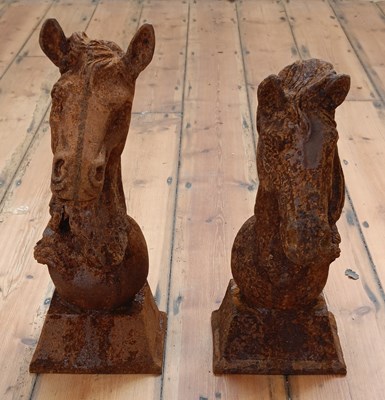 Lot 171 - A pair of rusted cast iron gate post finials,...