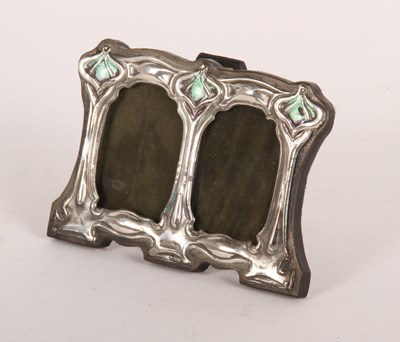 Lot 113 - An Art Nouveau style silver and enamel photo...