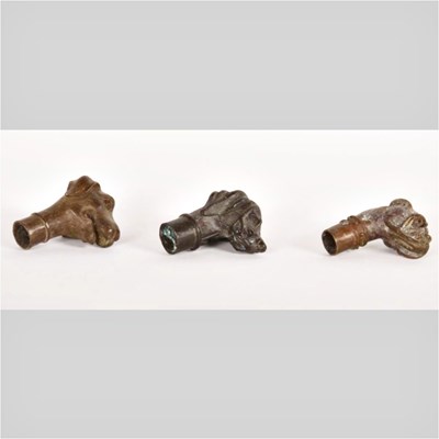 Lot 328 - A set of three metal novelty walking stick...