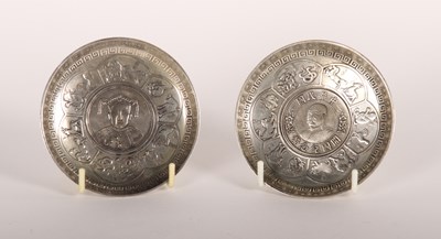 Lot 128 - A pair of Chinese white metal coin inset...