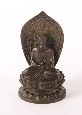 Lot 136 - A Chinese bronze figure of Buddha, shown...