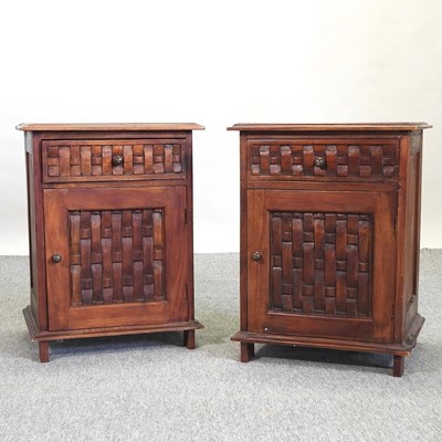 Lot 525 - A pair of modern hardwood bedside cabinets