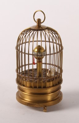 Lot 249 - A gilt metal automaton clock, in the form of a...