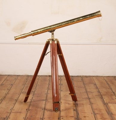 Lot 272 - A brass extending telescope, mounted upon a...