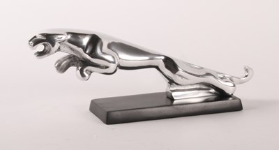 Lot 159 - A desk ornament, in the form of a Jaguar car...