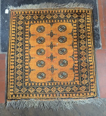 Lot 287 - A Turkish rug, on a yellow ground, 83cm x 105cm