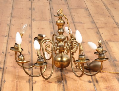 Lot 415 - A Dutch style eight brass candelabra, h.35cm