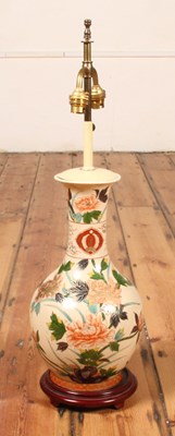 Lot 416 - A Chinese porcelain table lamp, of baluster...