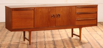 Lot 55 - A teak sideboard, 1960s, containing an...