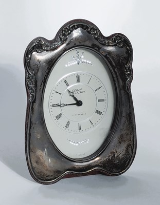 Lot 138 - A Carr silver clad mantel clock