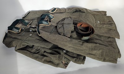 Lot 183 - A collection of military uniform, to include...