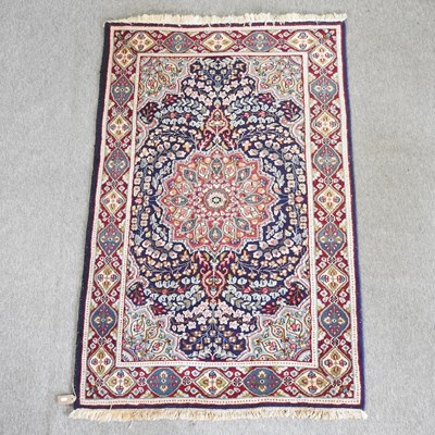 Lot 186 - A Persian woollen rug