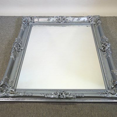 Lot 185 - A large silver painted wall mirror