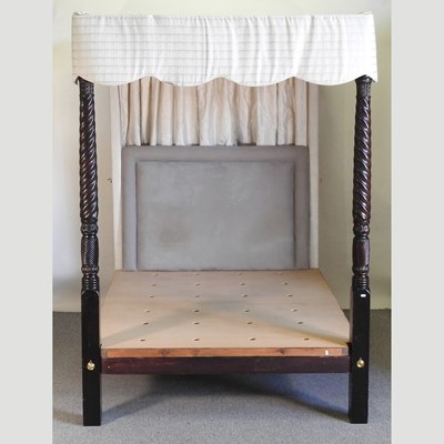 Lot 403 - An early 20th century four poster bed