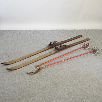 Lot 320 - A pair of vintage wooden skis and poles