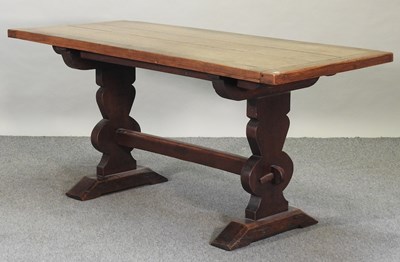 Lot 575 - An early 20th century oak refectory table