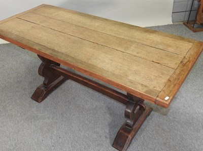 Lot 575 - An early 20th century oak refectory table