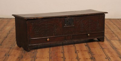 Lot 382 - A 17th century stained elm and fruitwood hinge...