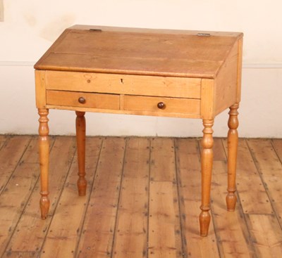 Lot 438 - A rustic pine slope front hinge clerk's desk,...