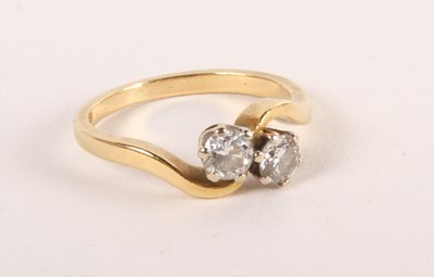 Lot 240 - An 18 carat yellow and white gold diamond...