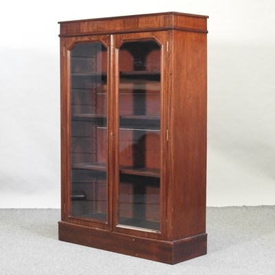 Lot 578 - A glazed mahogany dwarf bookcase