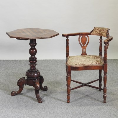 Lot 579 - A Victorian inlaid walnut games table