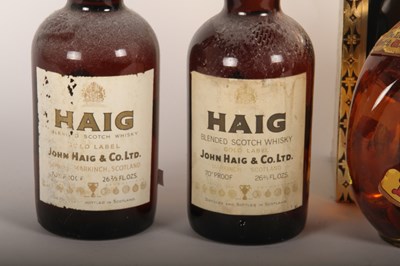 Lot 205 - Four bottles of Haig whiskey, two gold label,...