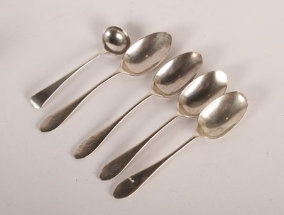 Lot 114 - A set of four George V silver spoons,...