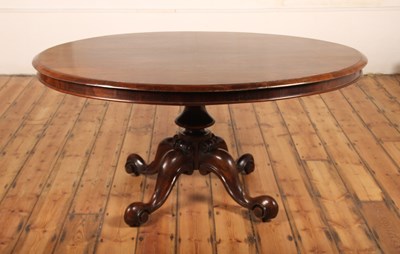 Lot 358 - A rosewood oval tilt-top table, 19th century,...