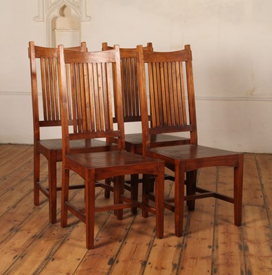 Lot 407 - A set of four teak stick back dining chairs, h....