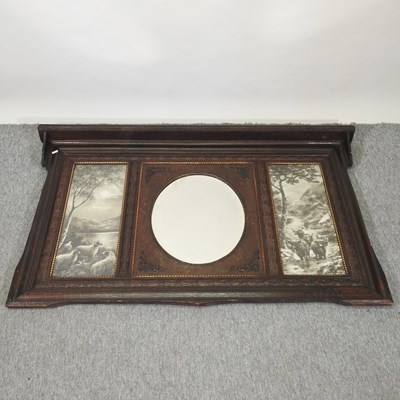 Lot 208 - An early 20th century carved oak framed over mantel mirror
