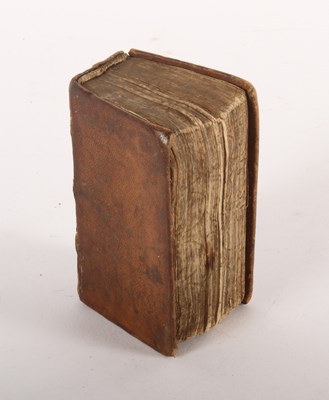 Lot 189 - A French miniature tan leather-bound New...