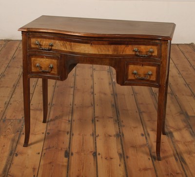 Lot 339 - A mahogany serpentine fronted dressing table,...