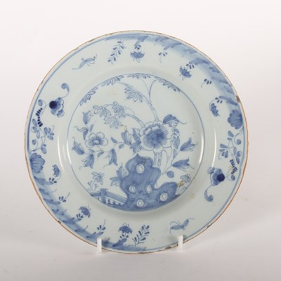 Lot 155 - An 18th century Delft blue and white plate,...