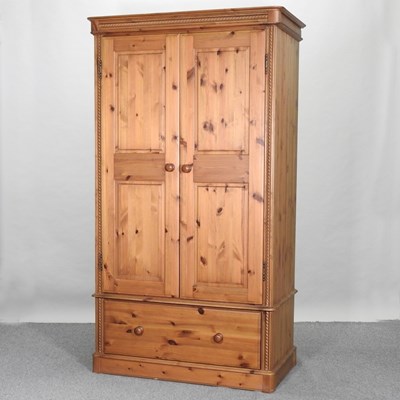Lot 429 - A modern pine double wardrobe