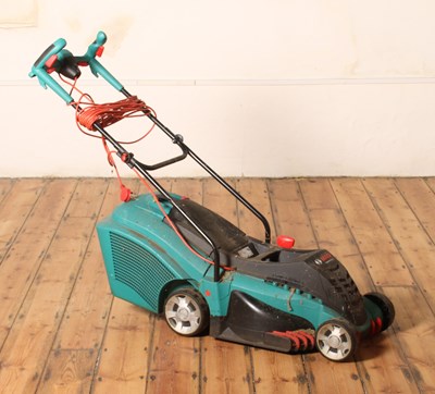 Lot 359 - A Bosch electric lawnmower, height of handle...