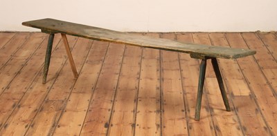 Lot 404 - A Cornish primitive green painted rustic stool,...