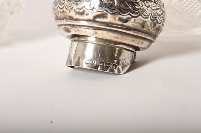 Lot 177 - Two Victorian silver lidded crystal jars h...
