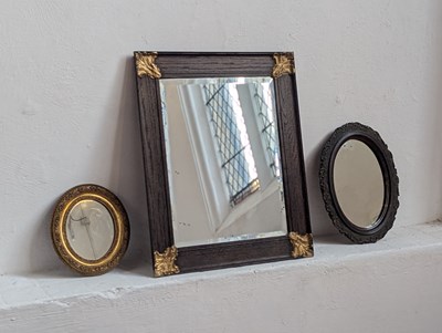 Lot 295 - An oak and parcel gilt wall mirror, 62 x 51cm,...