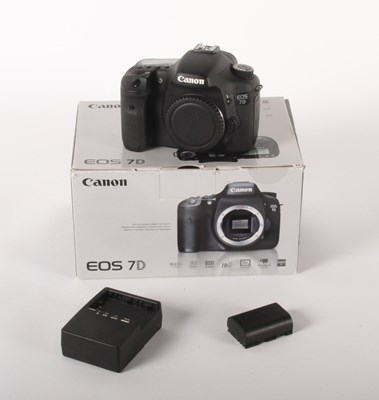 Lot 256 - A Canon Eos 7D digital SLR camera, boxed with...